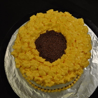 Sunflower Cake A tall 6" cake. I made the petals with tip #68, but wasn't thrilled with the results. I had to add so much piping gel to the...
