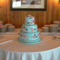 Blue Cake With Pink Anemones This is a blue Italian meringue buttercream iced wedding cake with pink Japanese anemones and was inspired by one of Elisa Strauss's...
