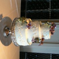 Grapes And Calla Lilies Tiramisu filling in vanilla chiffon cake with gumpaste grapes and calla lilies. The buttercream is Italian meringue buttercream and the...