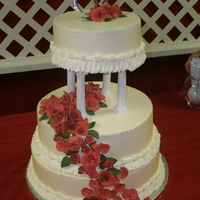 Valintine's Day Wedding Cake I made this cake for a wedding on valintine's day. It is a white cake with strawberry filling and IMBC icing. The flowers and leaves...