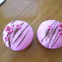 Caramel Mud Cakes Caramel Mud Cakes with pink fondant and modelling paste flowers. For my brother's wedding