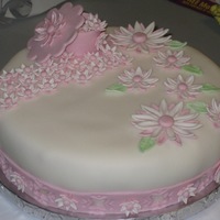 Fondant/gum Paste Daisies Last cake for Wilton Course 4. Vanilla Cake w/ Choc Chip Cookie Dough filling.