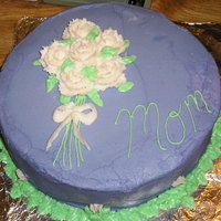For My Mother-In-Law This cake was made in a wilton cake class. This is the 2nd cake I made. But it was my first try on roses. The roses suck but my instructor...