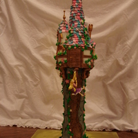 Rapunzel's Tower Cake I made this cake for my daughter's 6th birthday. The tower is all cake with hand-painted fondant. The house is cake with rice krispie...