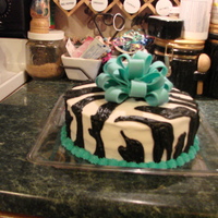 Zebra Print With Teal Bow This cake is yellow with chocolate filing. My Niece and I made this cake for her 15th Birthday. She loved it and it was LOTS of fun to make...