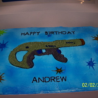 Laser Tag Birthday Cake This one is all buttercream iced. I free hand drew the laser tag gun by looking at a box for one of my son's toys. It turned out much...