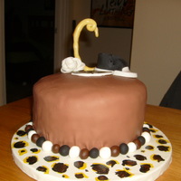 Sneaker For a friend who loves her chucks. Had a LOT of problems with the fondant because of the humidity. Ran out of time (and patience) to put...