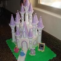 Princess Castle Cake 6 in. top tier, 10 in. bottom. Cakes and towers all iced in Buttercream with fondant accents.