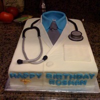 Lab Coat Buttercream with Fondant accents and fondant Caduceus. Made for a doctor friend's 40th birthday. Thanks to all the other Lab coat...