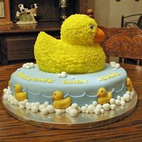 Ducky This is a cake I did for a baby shower. Can't take credit for the design, it's from the 2003 Wilton yearbook, page 57.