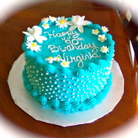 Teal Birthday Cake 8 inch cake, buttercream icing, shell border, flowers made from gumpaste/fondant