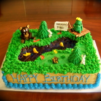 Fishing Cake A fishing cake I made for my nephews birthday. Butercream icing, trees, flowers, and animals made from fondant. Water is piping gel tinted...