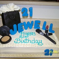 Shopping For Make Up All edible made of modeling chocolate on a butter pecan carmel cake