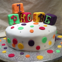 1St Birthday Cake With Letter Blocks This is only my second attempt at cake making/decorating. It was made for my daughters 1st birthday in December.