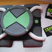 Ben 10 Omnitrix Cake My son is a big Ben 10 fan and wanted an omnitrix cake for his 4th birthday.It took me a while to work out how best to do it, but I was...