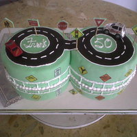 Road Signs Cake This cake was made to a guy that work at the Motor and Vehicules Department. His wife and daugher loved it.