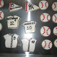 Baseball Cookies Made for my niece and nephews teams sugar cookies with MP Buttercream. I used a baby onesie cookie cutter and cut the bottom off for the...