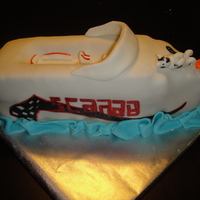 Scarab Boat This Scarab boat was carved from stacked carrot cakes and covered in white fondant. The markings on the side were hand-painted with diluted...