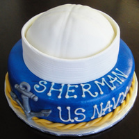 Us Navy Cake A double layer vanilla cake covered in fondant and airbrushed blue. The sailor hat is also vanilla cake covered in white fondant and...