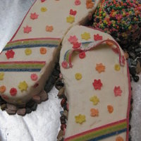 Flip Flops Rice Krispy cake and hacky sac. Used nerds, start burst and sour strips with BC and RI as glue. Young lady who received was pleased. She...