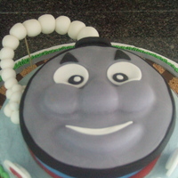 Thomas The Train There are so many great Thomas the Train cakes on this site....I took ideas from several and combined them. This is what I got. The cake...