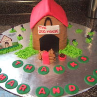 Dog House I made this as a thank you for the company that dog sits for my family. Covered in fondant and all accents are fondant as well.