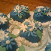 Mini Cakes chocolate 2 layer ckes with chocolate almond buttercream filling covered in mmf