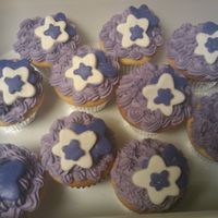 Cupcakes yellow cupcakes with purple raspberry buttercream frosting