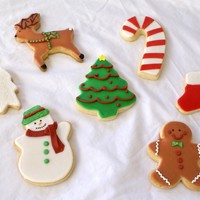 Christmas Cookies NFSC with toba's glace icing. Some with royal icing details and candy canes with fondant. Thanks!