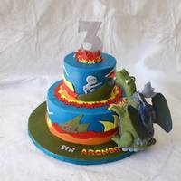 Dragon Cake 6" and 10" vanilla butter cake with cookies and cream filling. Sugarshack buttercream and fondant decorations. The dragon is made...