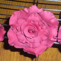 Red Rose Gumpaste roses made with ruby red paste color, lined with black powder color and dusted all over with red powder color and ruby red pearl...