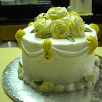Golden Roses My first "official" cake. A 50th anniversary cake done for a lady I know well. She asked for a 6" cake, simple, with gold...