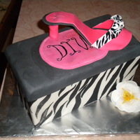 Diva Shoes Shoe box cake, covered in fondant, hand painted zebra stripes, gumpaste shoe. Made for bridal show.