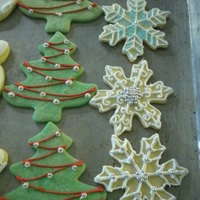 Christmas Cookies I used a roll out cookie receipe that I found on wilton's site, used color flow icing