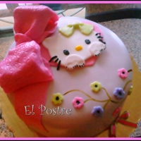 Hello Kitty 4" Amaretto chocolate cake. Mojaito... 38 age birthday girl. Simple but turn sticky and no adorable in a rainy day. But she love it so...