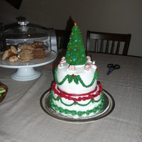 Christmas Tree Cake First time doing a tiered cake. I got a lot of inspiration from some of the pics here on this website! It is a white cake with Khalua...