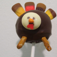Turkey Cake Pops chocolate cake, the head is a chocolate covered espresso bean, the gobbler (official term ;) is an upside down heart.