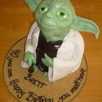 Yoda In 3D This was a cake I made for a friends husband who LOVES starwars.the head was made using rice crispy's and the body was in white and...