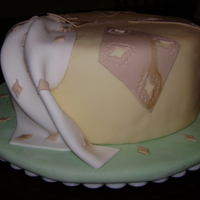 Wilton Course 4 Class 2 This is the second cake for the fondant and gumpaste class. My teacher said it would be an ugly hodgepodge cake and I decided to make it...