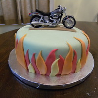 Harley Cake Chocolate cake filled and covered with peanut butter buttercream and covered in MMF. Inspired by several cakes on CC!