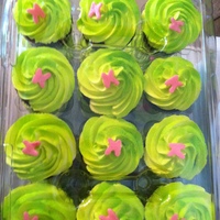 Cupcakes Buttercream icing with rolled buttercream letter "k"