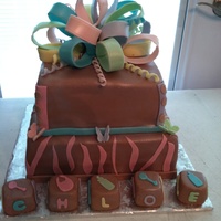 Baby Shower Delicious Chocolate cake covered in marshmallow fondant. All accents are marshmallow fondant.