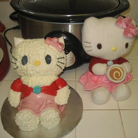 Hello Kitty This is a Red Velvet Cake with Cream Cheese Frosting. I used MMF for her dress.