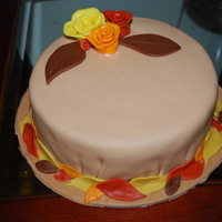 Thanksgiving/birthday Cake I decided to give the free form roses (from that Youtube video!) a try. Not bad for a first time. Everything's fondant.