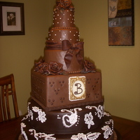 Chocolate Fondant Anniversary Cake Chocolate fondant. Chocolate roses and bow.