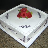 Bridal Shower Cake Vanilla cake with strawberry filling covered in vanilla buttercream. Fondant flower accents