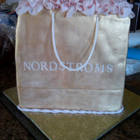 Nordstroms Bag A Nordstroms shopping bag for a bridal shower. The cake is covered in rolled fondant with gum paste tissue and handles.
