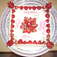 Strawberries & Cream Strawberry cake, with chunky strawberry filling. Frosted with cream cheese frosting. Decorated with fresh strawberries, whipped cream, and...