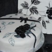 Black And White This is a midnight chocolate cake with a white vanilla buttercream. It was styled to match the gift bag for a friends wedding. TFL.