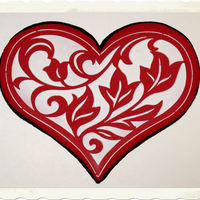 Valentine Cookies Chocolate cookies iced with royal icing and stenciled with royal icing. The ones on the plate are sanding sugar on royal icing. TFL